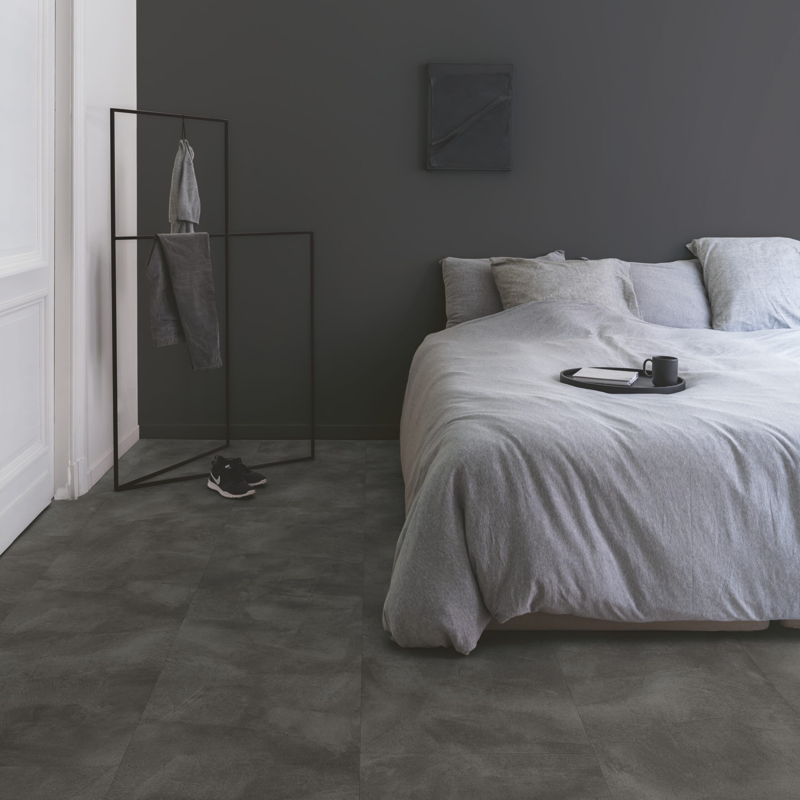 bedroom with dark flooring