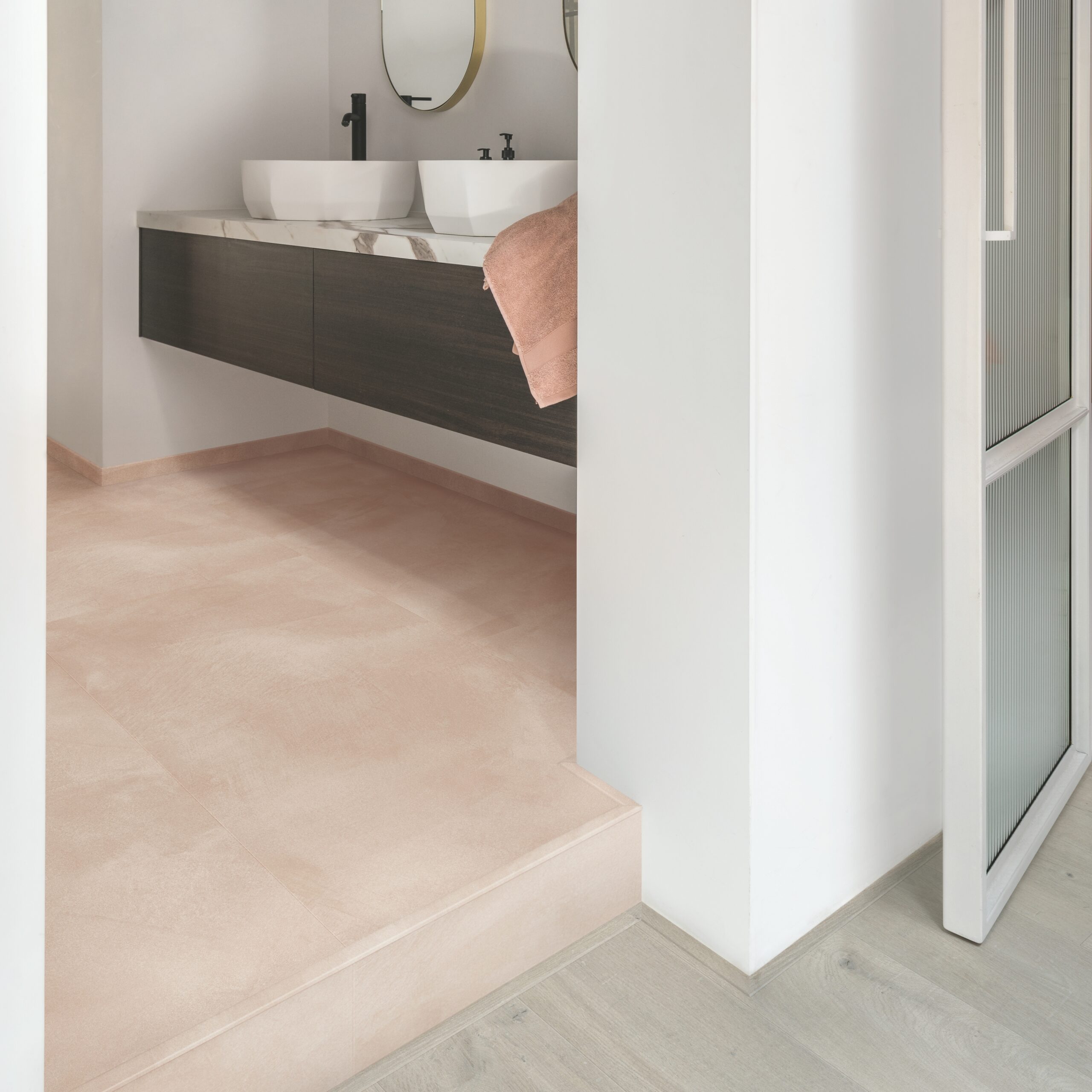 salmon coloured flooring twin sinks