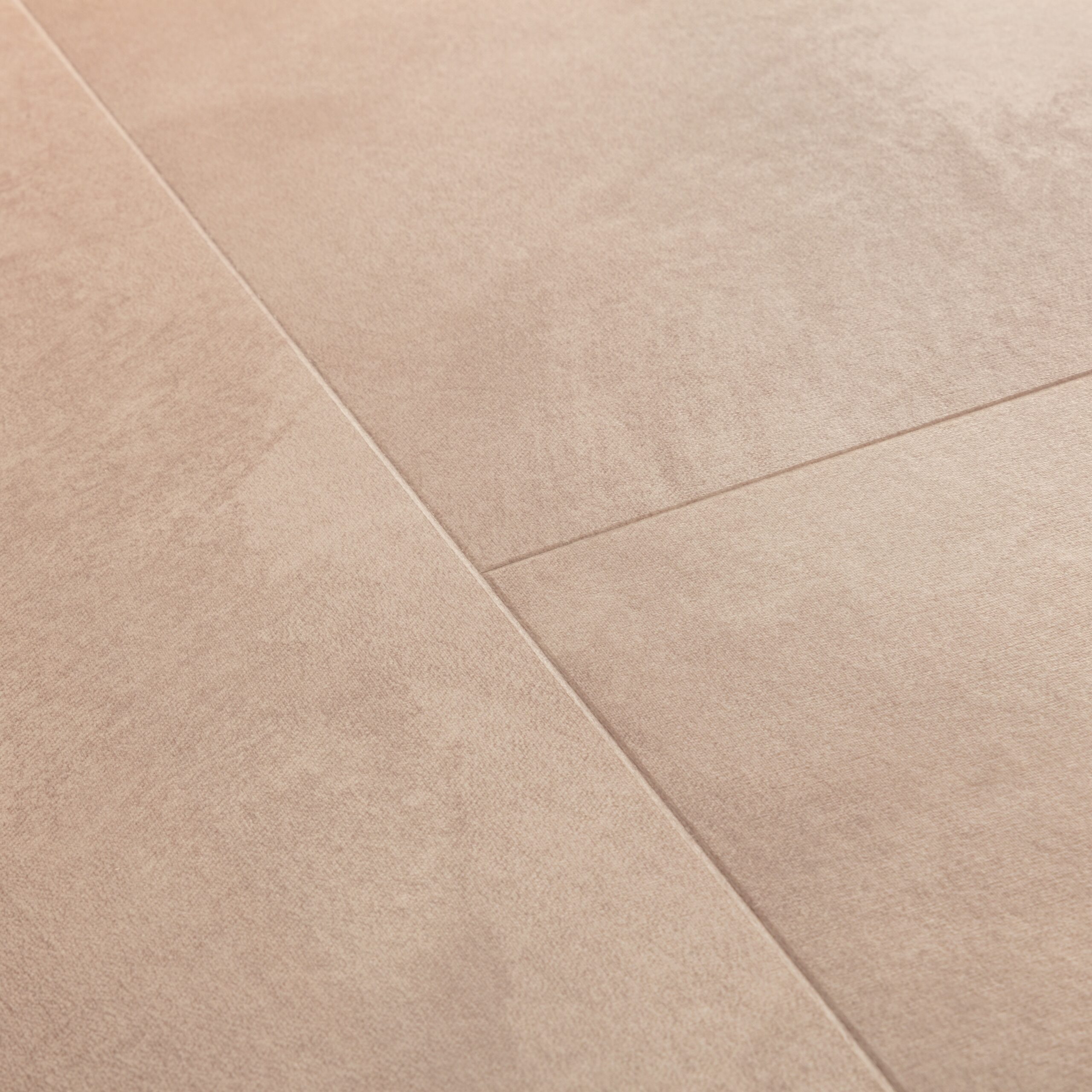 salmon coloured flooring close up