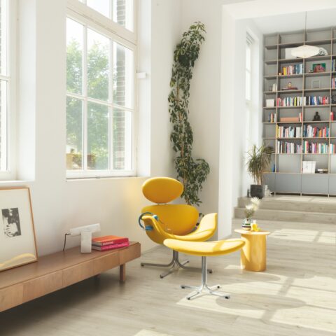 yellow chair with wooden floor